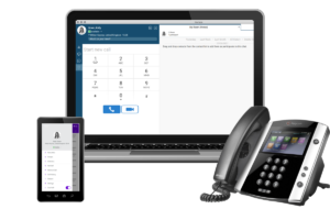 Hosted VoIP Solutions - Macbook, Smart Phone and Traditional VoIP Desk Phone on a white isolated background.